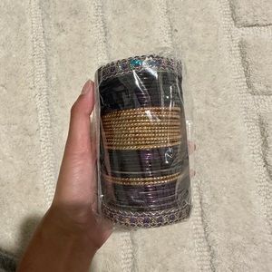 Brand new purple and gold bangles